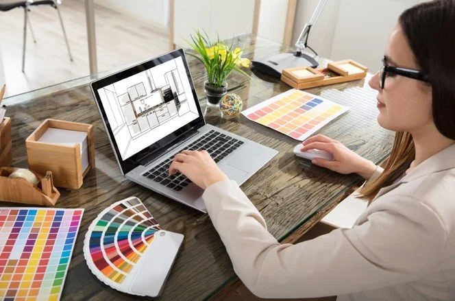 Kitchen interior designer working on a design on a computer