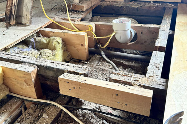 Bathroom with joints that are not up to code prior to a renovation
