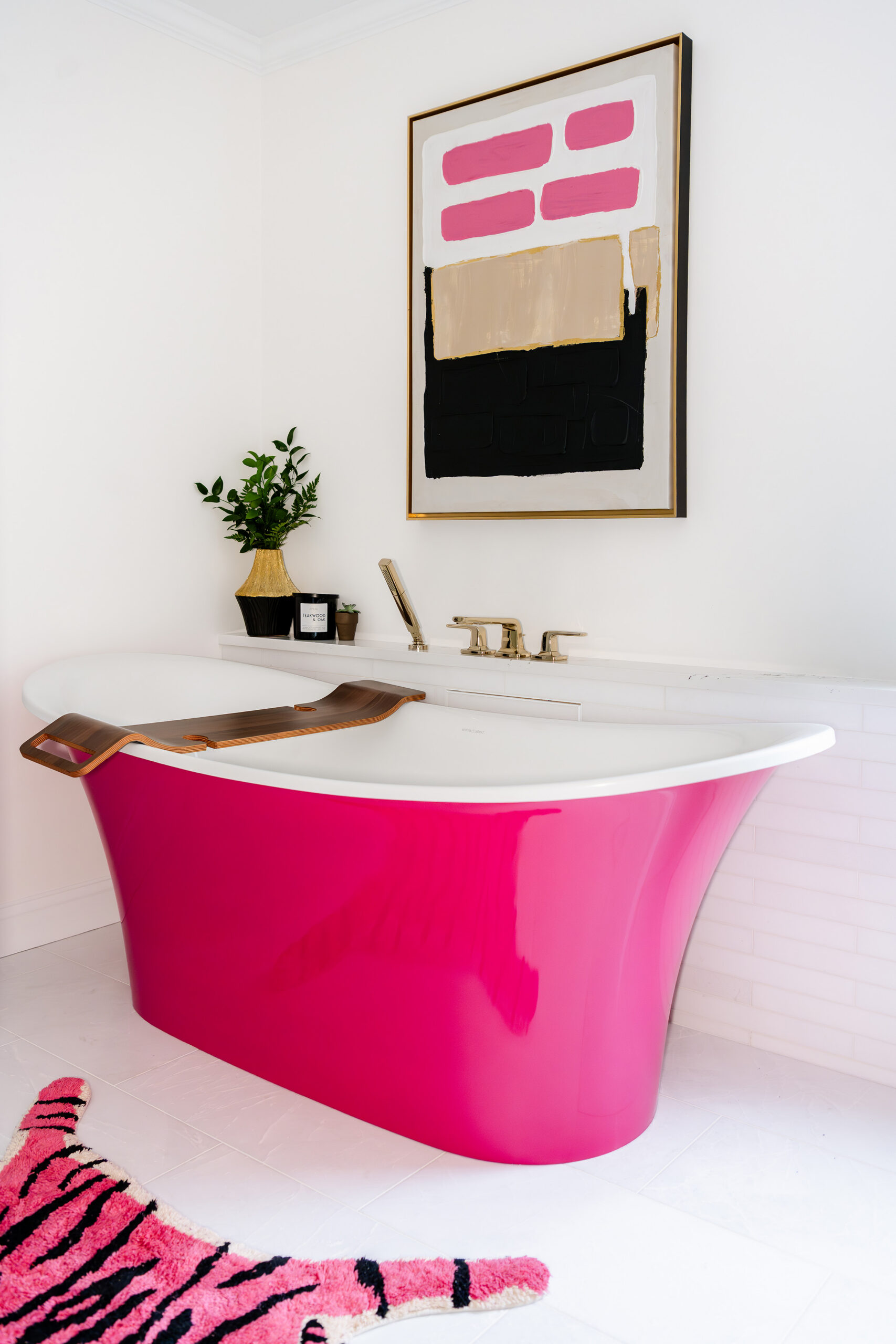 Bright fuchsia tub in a unique bathroom remodel by Marlene & Co