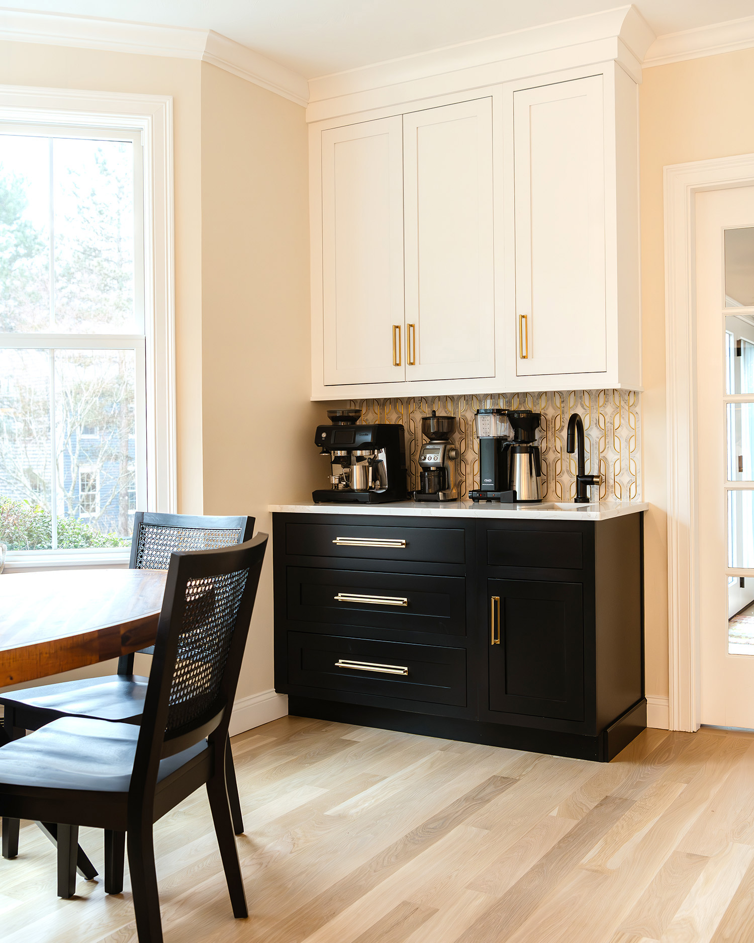 Kitchen remodel where a window was removed for a custom coffee bar by Marlene & Co