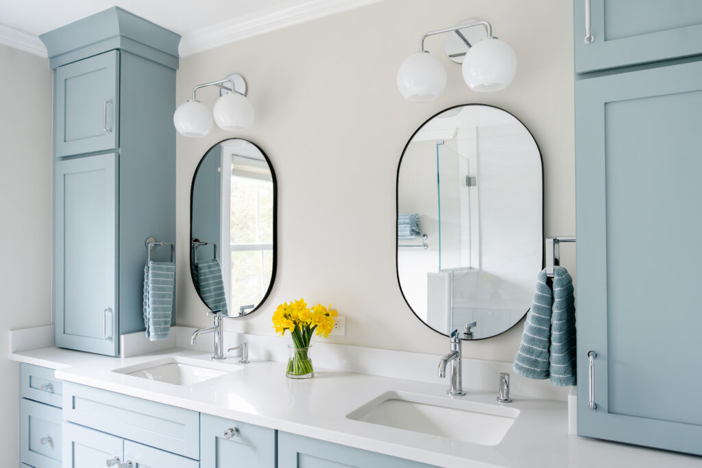 Double Vanity with Blue Custom Cabinetry by Marlene & Co