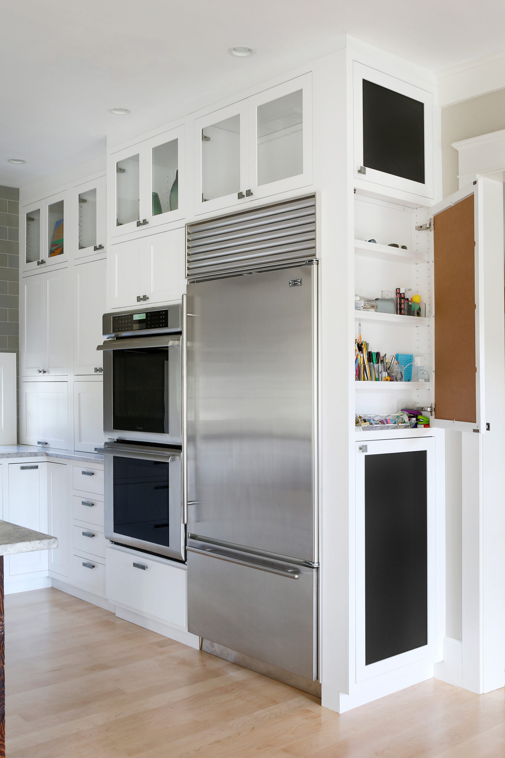 White Kitchen Remodel with Stainless Steel Appliances Designed by Marlene & Co
