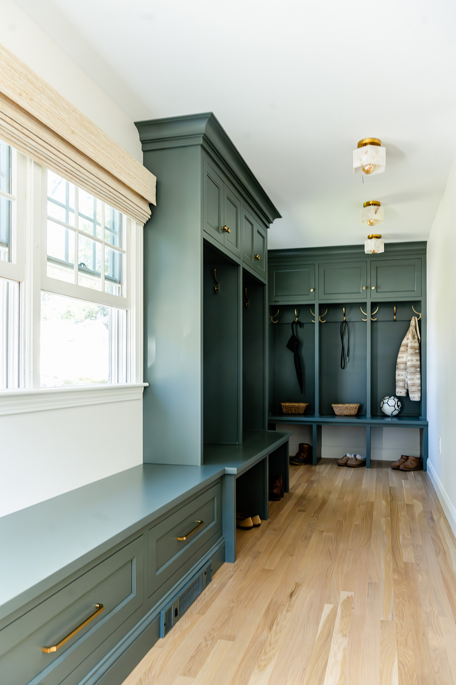 Mudroom with Green Custom Cabinetry in Hingham, MA Designed & Built by Marlene & Co